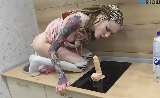 Riding Dildo on Kitchen Counter with Tattoos and Braids